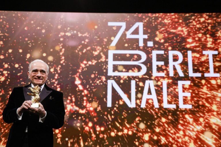 Martin Scorsese wins lifetime achievement award at Berlin Film Festival with support from sexy goddess

