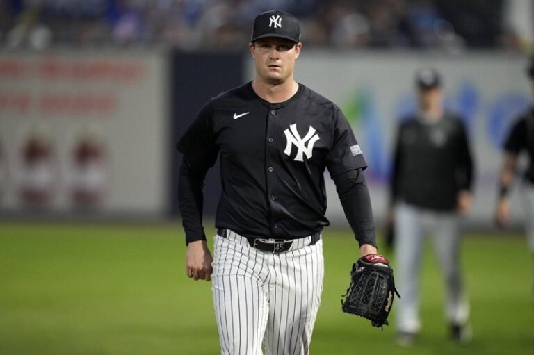 MLB/Yankees ace Cole to be out at least 1 month after investigation into elbow problem

