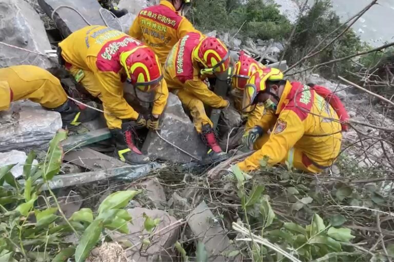  The husband was buried alive by a rock during the earthquake, but his left hand was missing.  His wife and daughter asked search and rescue teams to successfully recover him.

